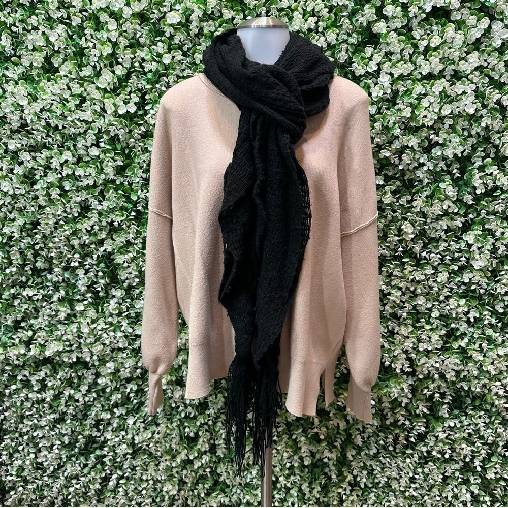 Simple and classic black knit scarf with handkerchief hem and fringe